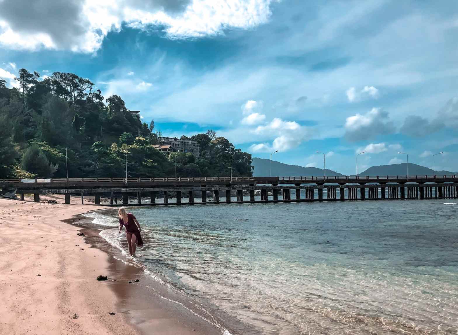 Woman walking in beach in Phuket, Thailand