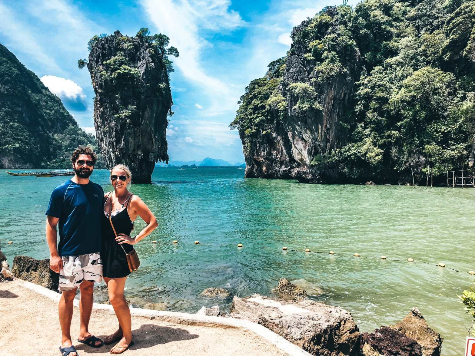 Man and woman standing in front of James Bond Island