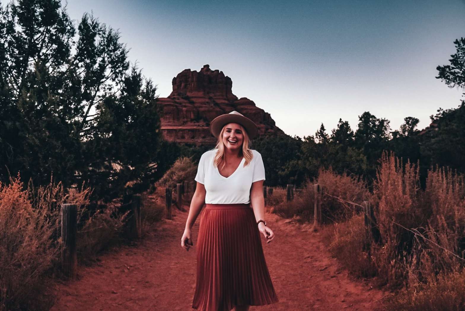 Woman in front of Bell Rock in Sedona