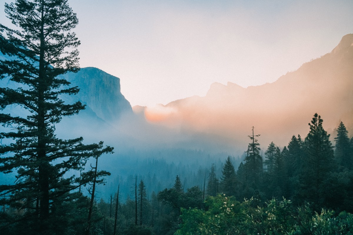 Shot from Tunnel View during sunrise with smoke from a controlled burn in Yosemite