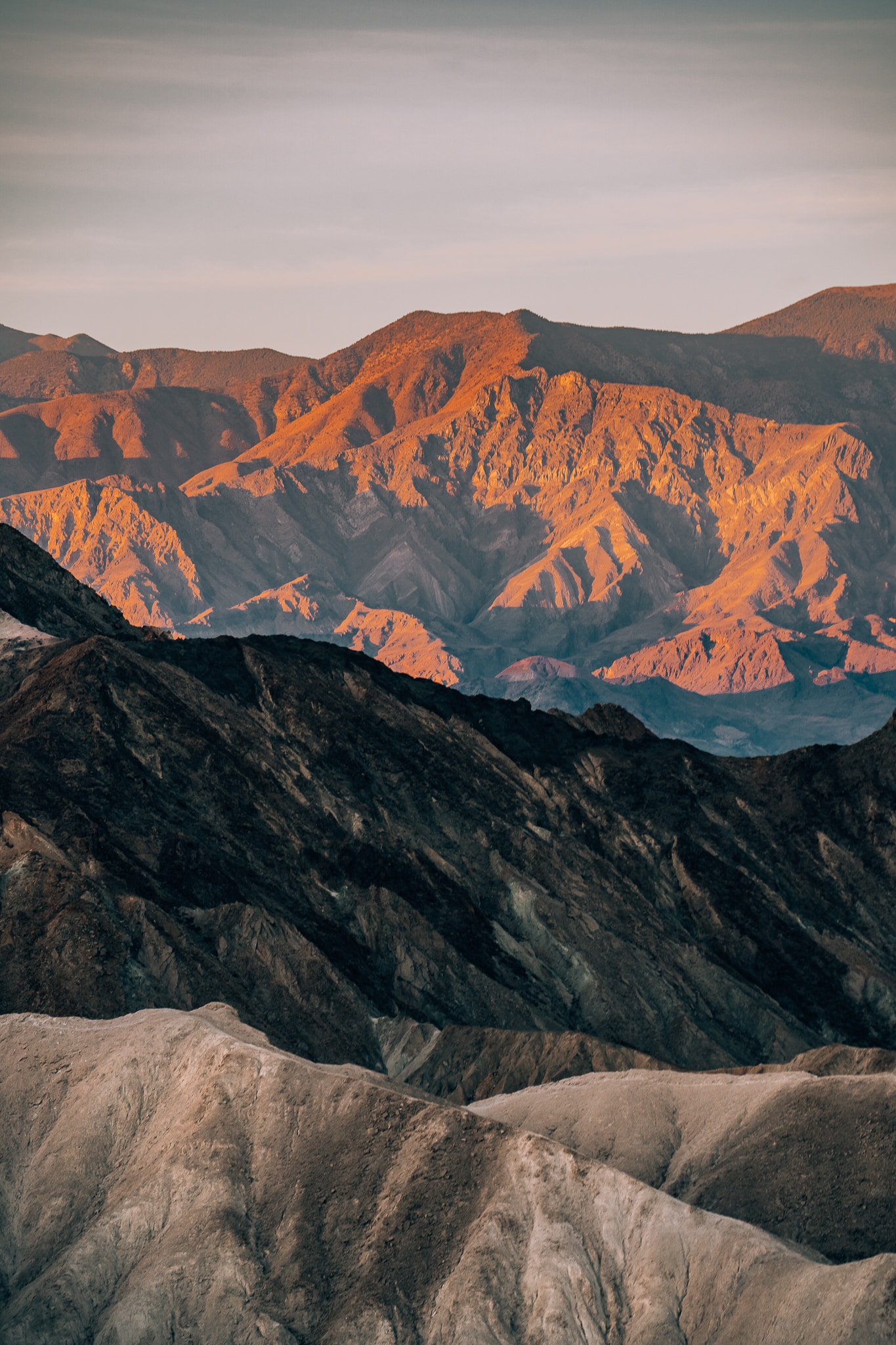 Mountain layers showing colors during sunrise at Zabrinskie Point in Death Valley National Park