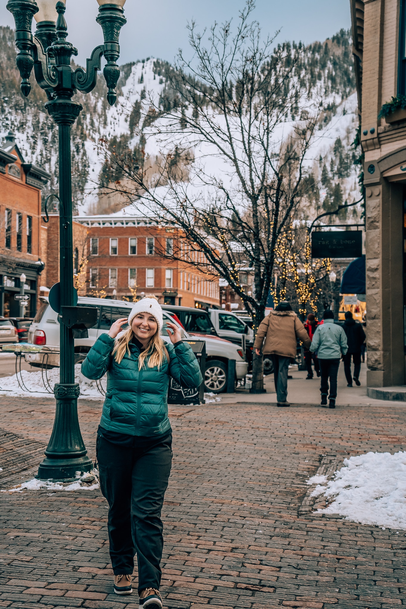 Woman in Aspen wearing all of her winter gear