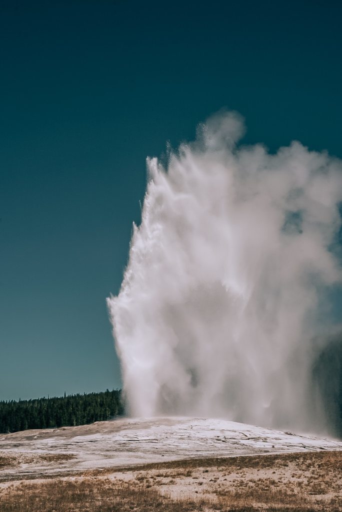 Old Faithful geyser blowing