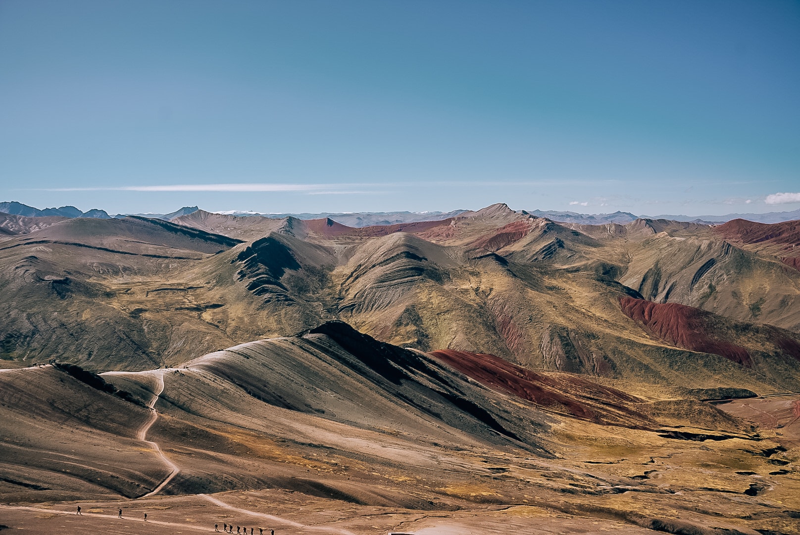 Landscape of many rainbow striped mountains at Palccoyo in Peru